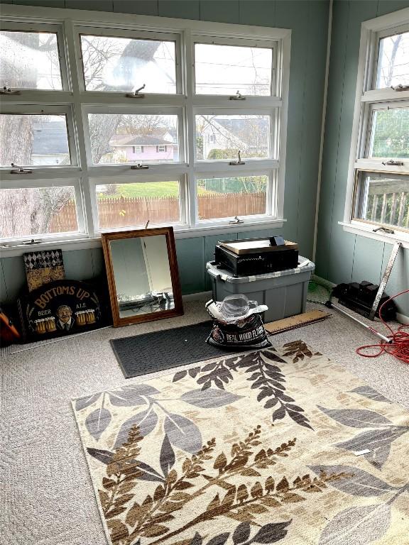 sunroom featuring a wealth of natural light