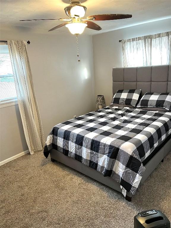 bedroom with carpet flooring and ceiling fan