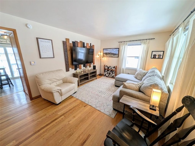 living room with light hardwood / wood-style floors