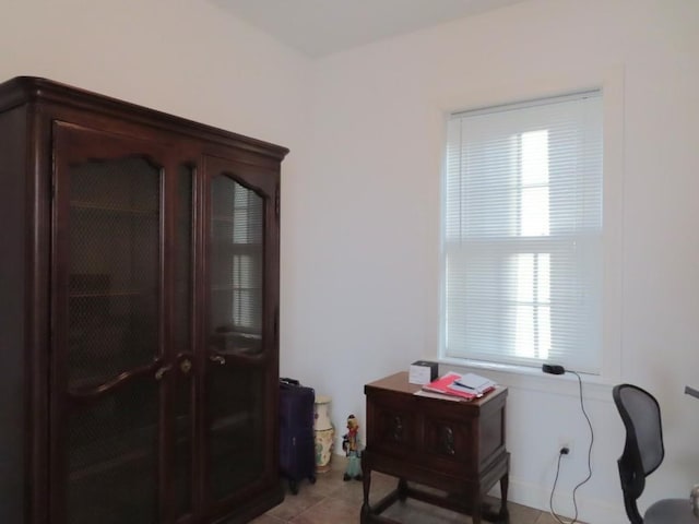 interior space featuring light tile patterned floors