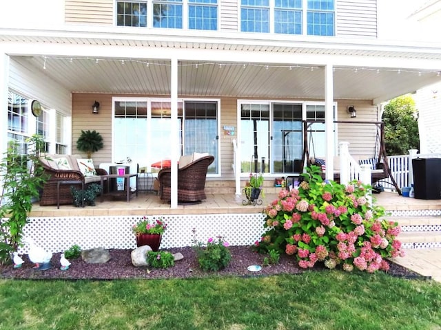 exterior space featuring outdoor lounge area and a porch