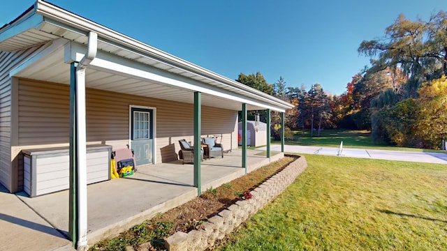 view of patio / terrace with a carport