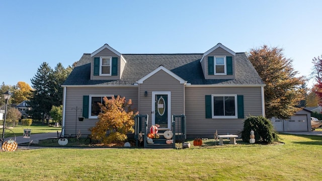 cape cod home with a front yard