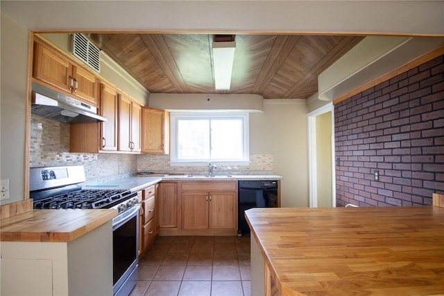 kitchen featuring wooden counters, decorative backsplash, black dishwasher, and stainless steel gas range oven