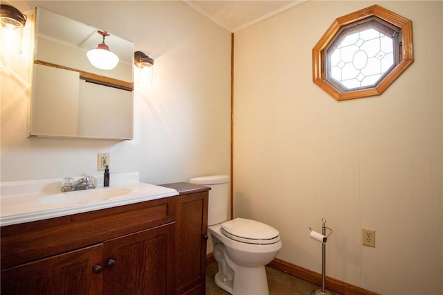 bathroom with tile patterned floors, vanity, and toilet