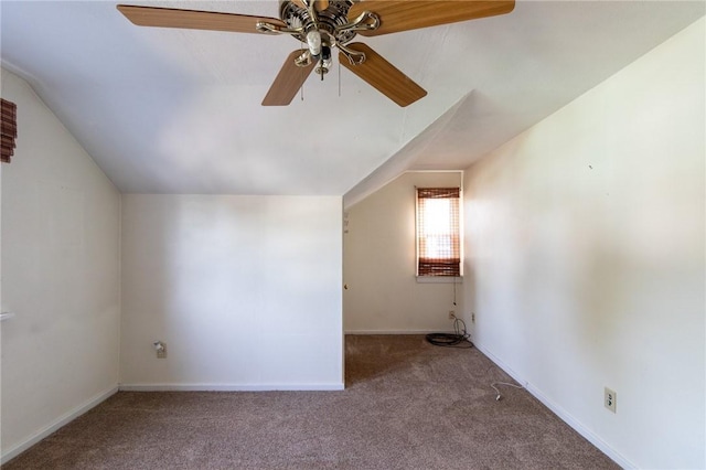 bonus room with carpet floors, vaulted ceiling, and ceiling fan