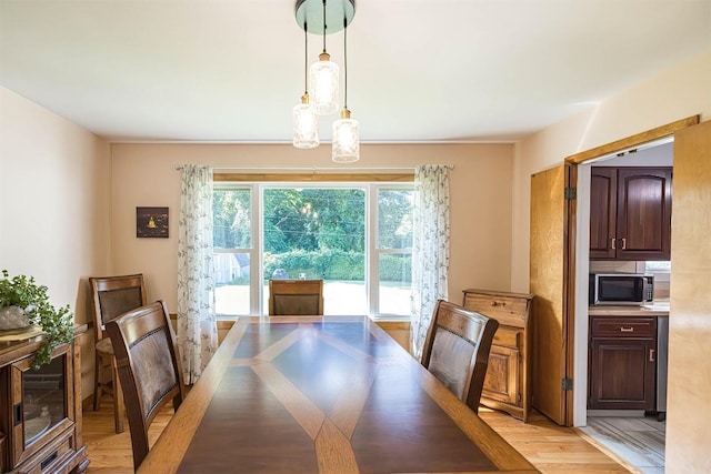 2548 E 32nd St, Erie, PA 16510 - dining area featuring light wood finished floors