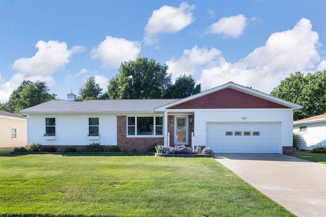 2548 E 32nd St, Erie, PA 16510 - ranch-style house featuring driveway, a garage, a front yard, and brick siding