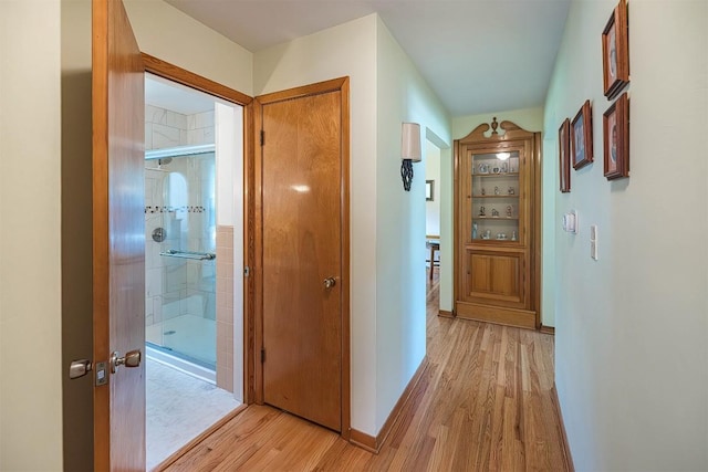 2548 E 32nd St, Erie, PA 16510 - corridor with light wood-style flooring and baseboards