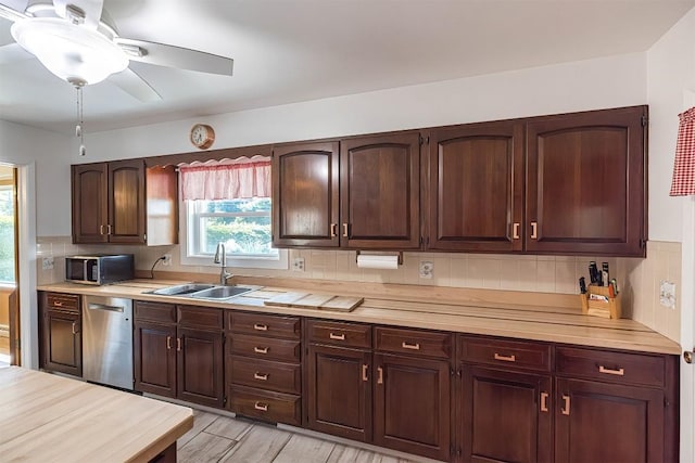 2548 E 32nd St, Erie, PA 16510 - kitchen featuring appliances with stainless steel finishes, light countertops, tasteful backsplash, a ceiling fan, and dark brown cabinets
