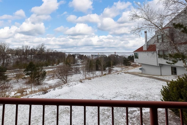 view of yard layered in snow