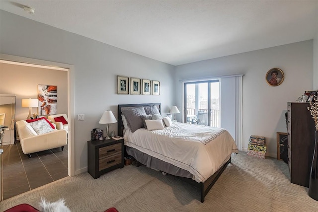 tiled bedroom with carpet flooring and baseboards