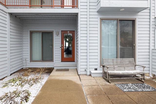 property entrance with a balcony