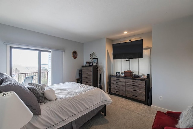 bedroom featuring access to exterior, baseboards, and light colored carpet