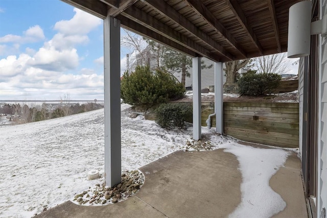 view of snow covered patio