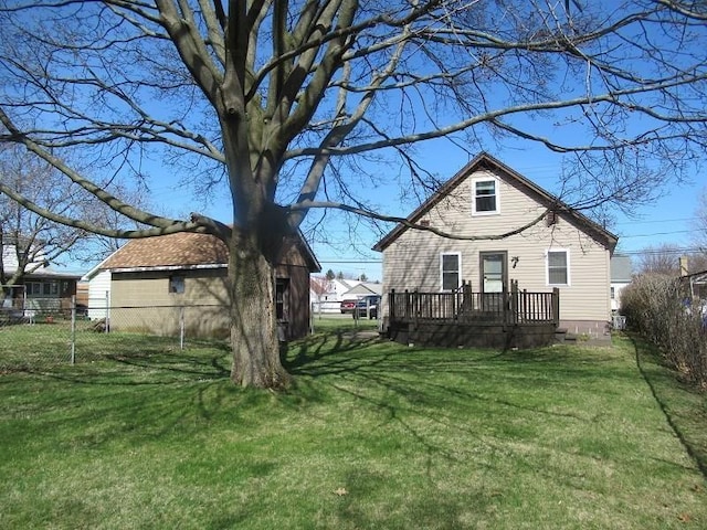 exterior space featuring a yard and a deck