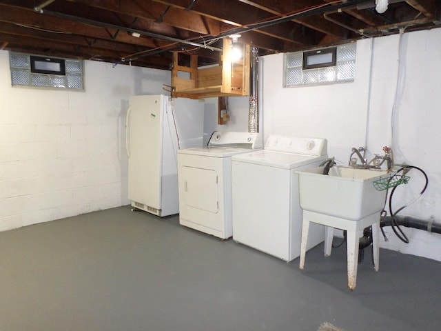 clothes washing area featuring washing machine and dryer