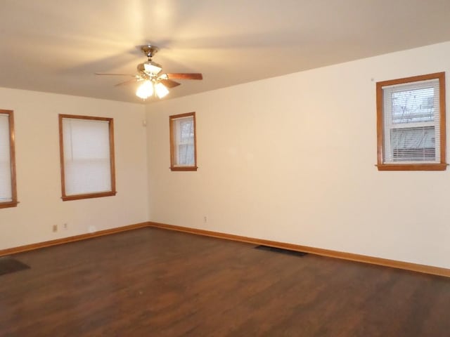 unfurnished room featuring hardwood / wood-style floors and ceiling fan