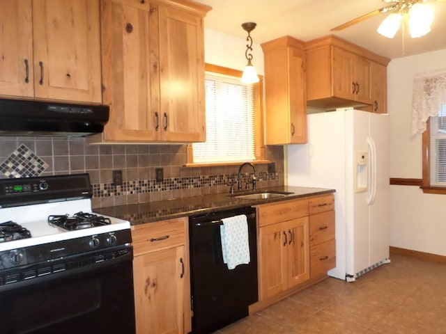 kitchen with sink, tasteful backsplash, hanging light fixtures, black dishwasher, and range with gas stovetop