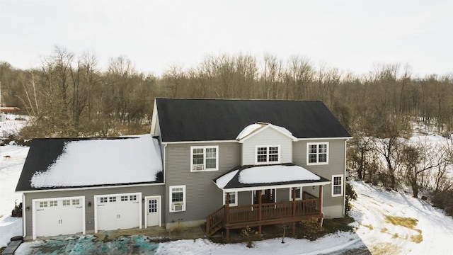 view of front of home with a garage and covered porch