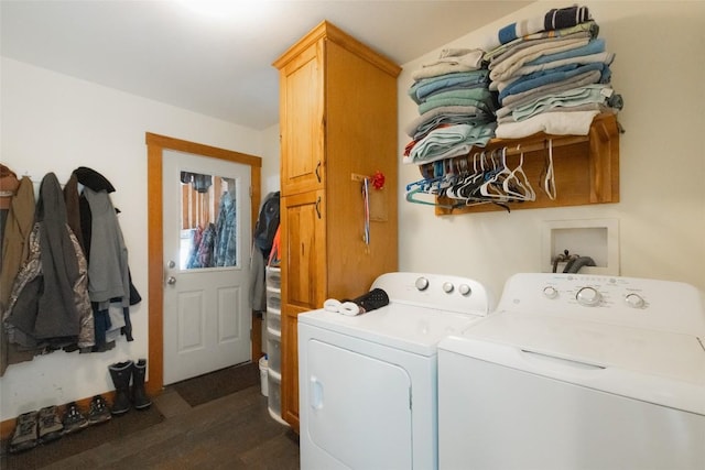 laundry room with cabinets, dark hardwood / wood-style floors, and independent washer and dryer