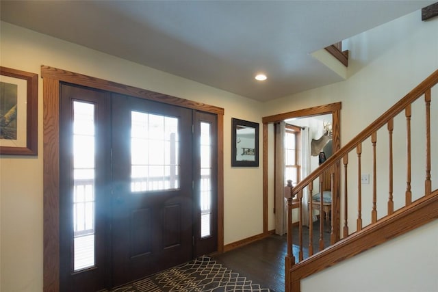 foyer entrance featuring dark hardwood / wood-style flooring