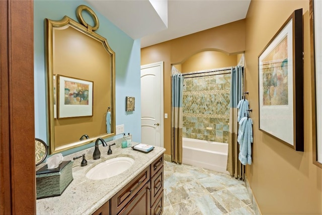 bathroom with shower / bath combination with curtain and vanity