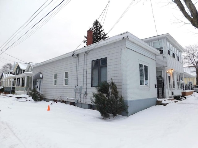 view of snow covered property