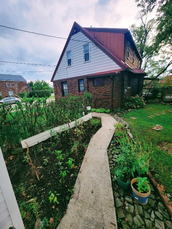 view of home's exterior featuring a lawn