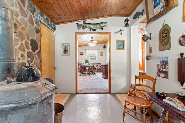 6946 Huntley Rd, West Springfield, PA 16443 - office space with wooden ceiling, a wood stove, finished concrete floors, and a ceiling fan