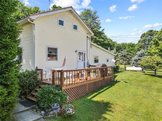 6946 Huntley Rd, West Springfield, PA 16443 - rear view of property with a yard and a wooden deck