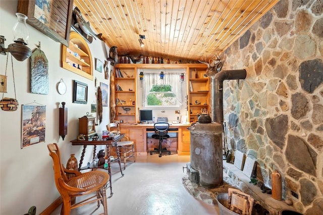 6946 Huntley Rd, West Springfield, PA 16443 - office space featuring vaulted ceiling, wooden ceiling, concrete floors, and a wood stove