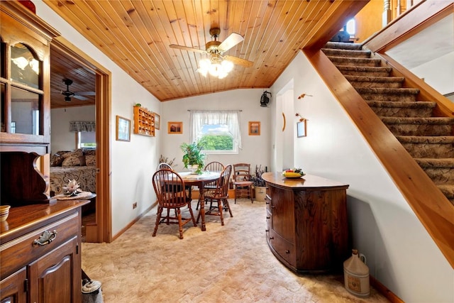 6946 Huntley Rd, West Springfield, PA 16443 - dining room featuring wooden ceiling, ceiling fan, light colored carpet, stairway, and lofted ceiling