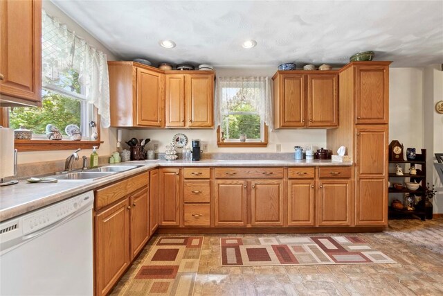 6946 Huntley Rd, West Springfield, PA 16443 - kitchen with white dishwasher and light countertops