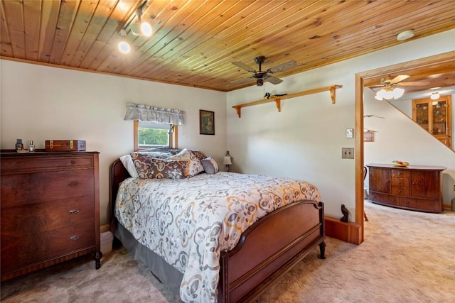 6946 Huntley Rd, West Springfield, PA 16443 - carpeted bedroom with wood ceiling, crown molding, and a ceiling fan