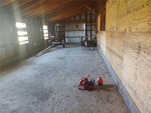 misc room featuring lofted ceiling