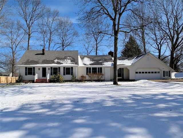 view of front of home featuring a garage and a chimney