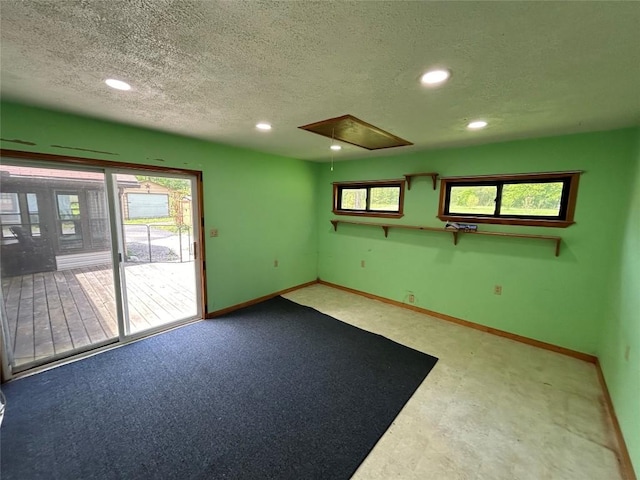 2892 Township Rd, Linesville, PA 16424 - spare room featuring attic access, recessed lighting, baseboards, and a textured ceiling