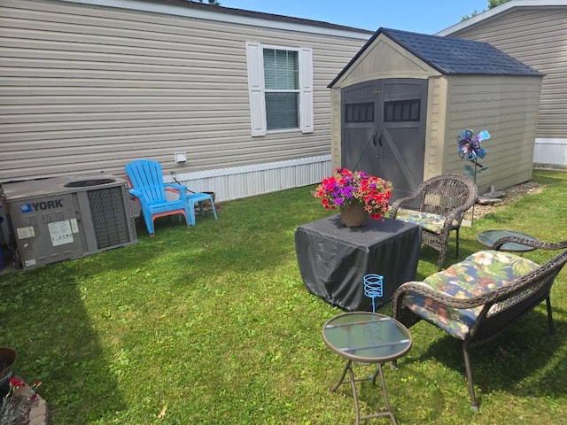 2719 Green Hill Dr, Millcreek, PA 16506 - view of grassy yard featuring a storage shed