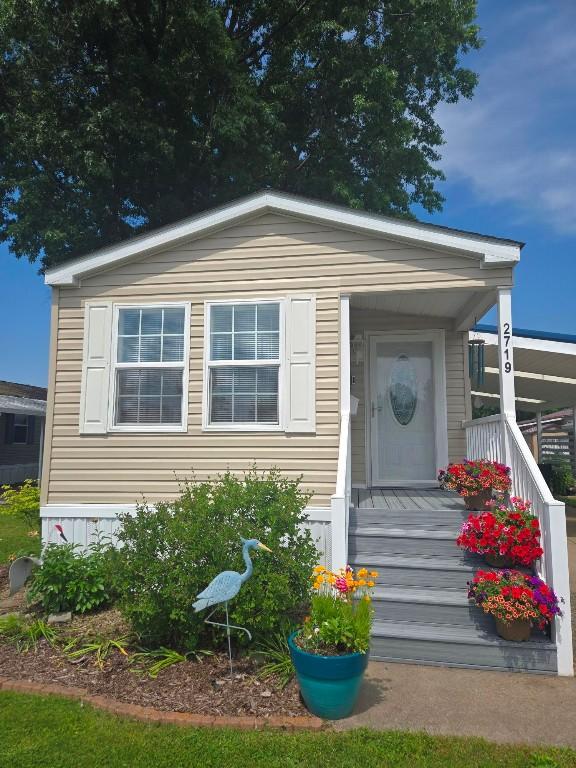 2719 Green Hill Dr, Millcreek, PA 16506 - view of exterior entry with a porch