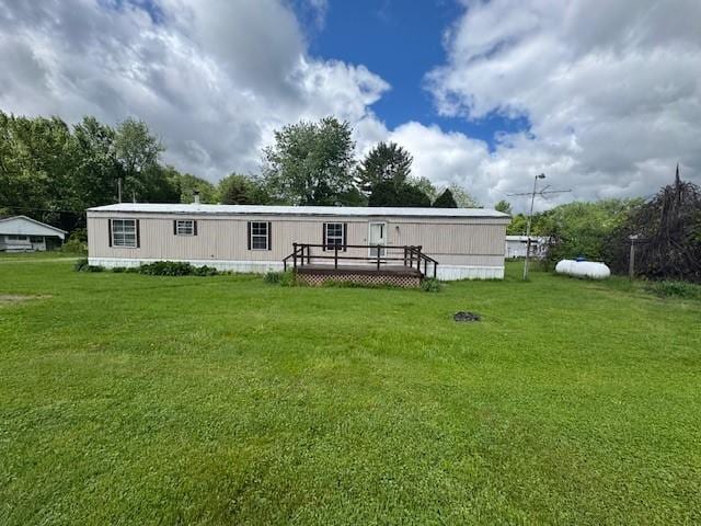 2409 N Shore Dr, Linesville, PA 16424 - back of property featuring a deck and a lawn