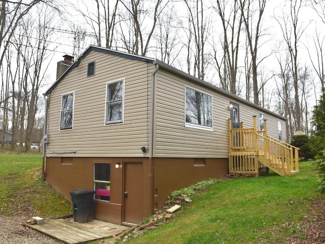 12322 N Watson Run Rd, Conneaut Lake, PA 16316 - view of side of property with a yard and a chimney