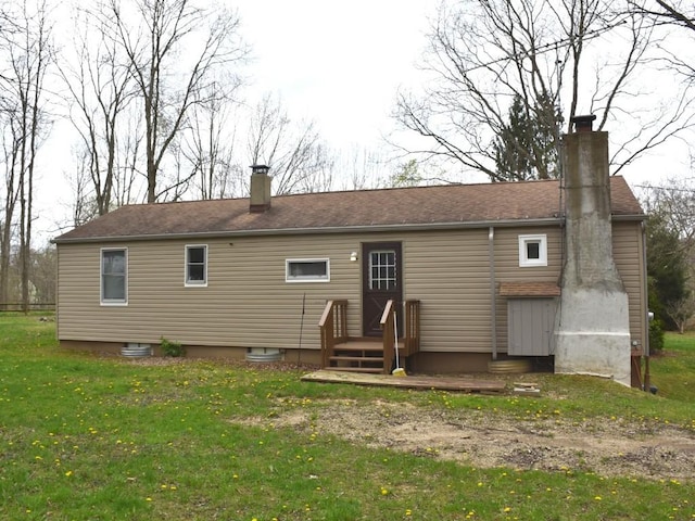 12322 N Watson Run Rd, Conneaut Lake, PA 16316 - back of property with a yard and a chimney