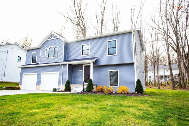 view of front property with a garage and a front lawn