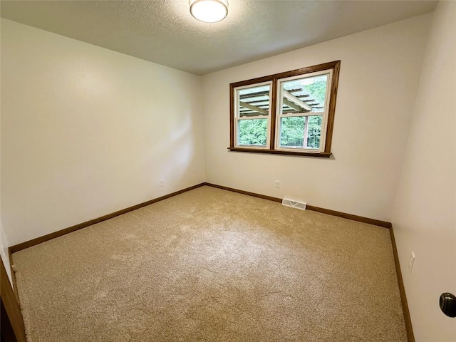 31050 US Highway 322, Cochranton, PA 16314 - carpeted empty room with baseboards and a textured ceiling