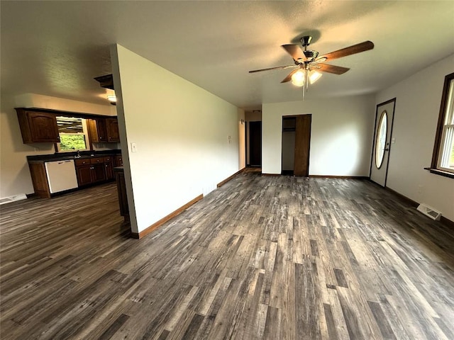 31050 US Highway 322, Cochranton, PA 16314 - unfurnished living room with dark wood finished floors, a ceiling fan, baseboards, and a sink