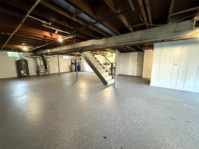 31050 US Highway 322, Cochranton, PA 16314 - unfinished below grade area with water heater, stairway, and heating unit