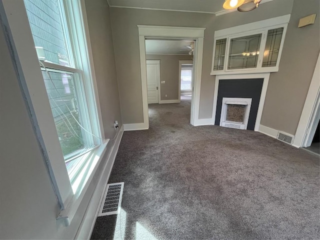 917 Walnut St, Erie, PA 16502 - unfurnished living room with carpet flooring, a fireplace, baseboards, and a ceiling fan