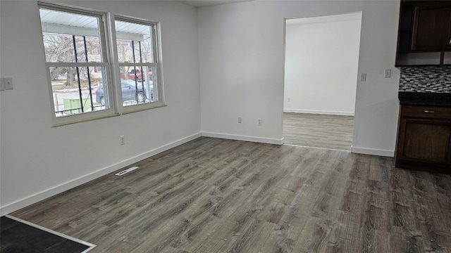 interior space with hardwood / wood-style floors