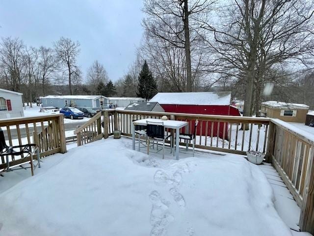 view of snow covered deck